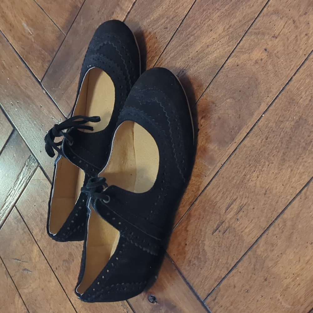 Black leather flats